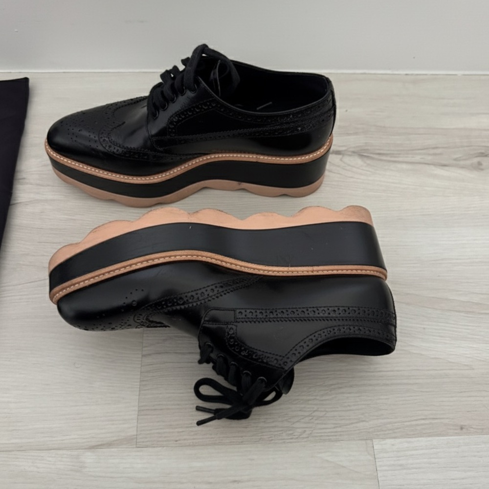 Prada black leather wingtip brogue platform derby